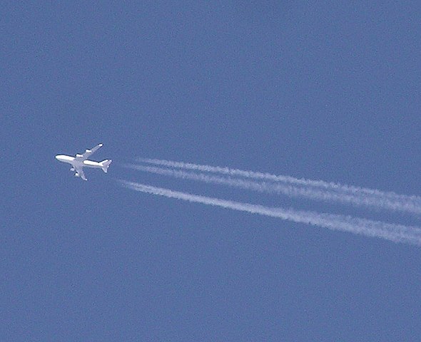 Contrails forming immediately behind an aeroplane