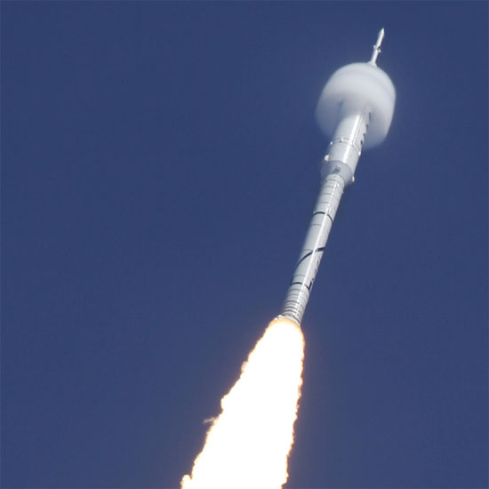 A cloud forming around the top of a rocket