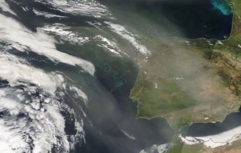 A satellite image of dust and plankton near Spain