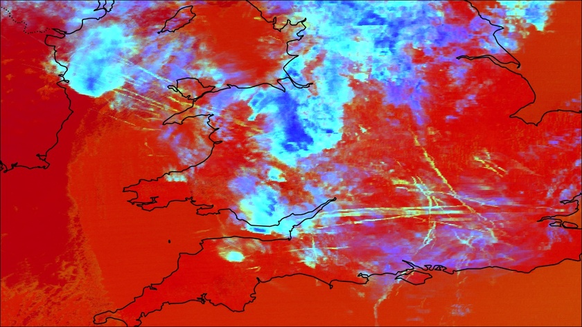 A false-colour image of contrails forming over the southern UK and Ireland
