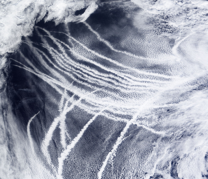 Bright lines in a field of clouds, viewed from space